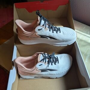 Altra Pink and White Athletic Shoes with Sleek Design